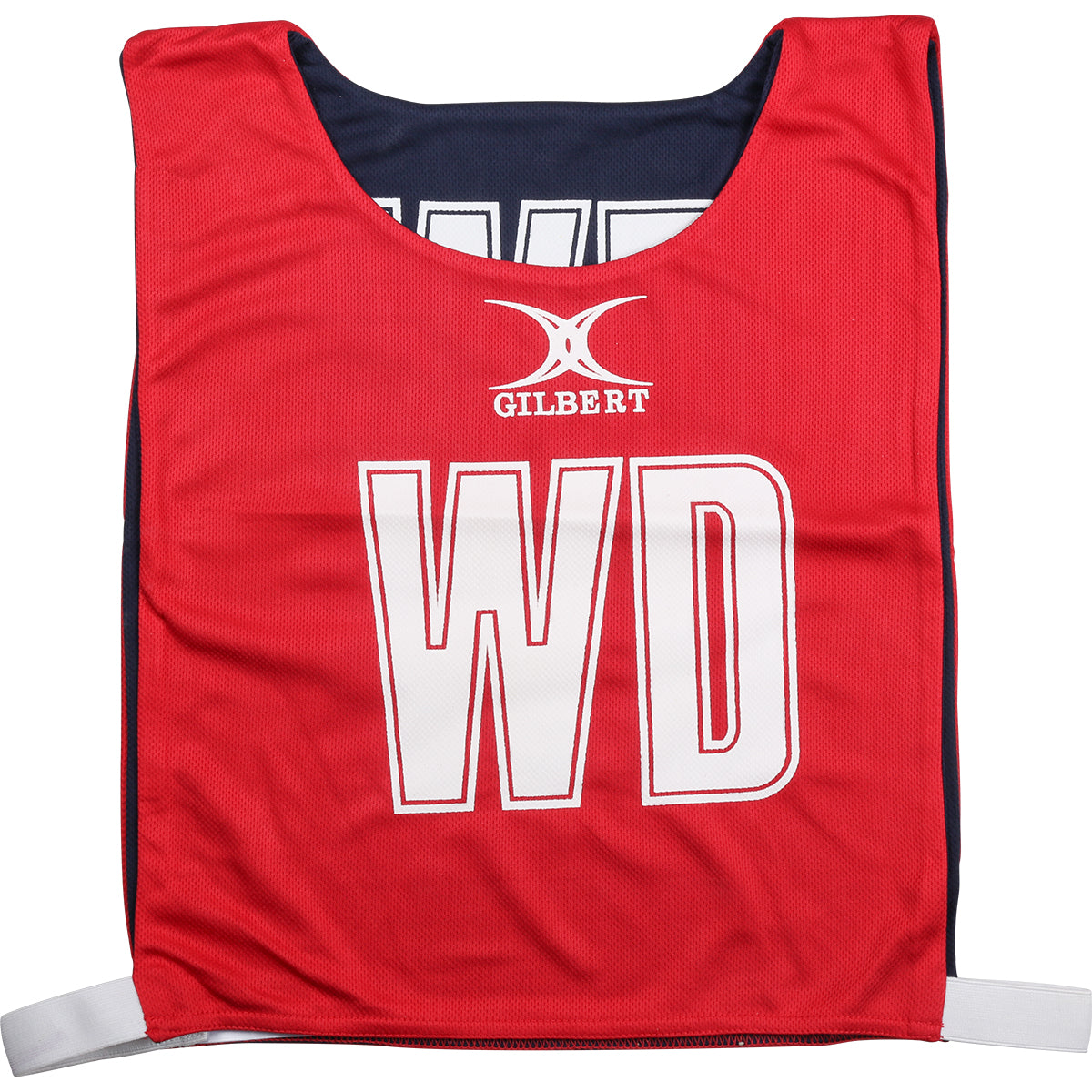 The Gilbert Reversible Netball Bibs in red/navy feature the GILBERT logo and large white WD letters on the front, with white hook-and-loop side straps for easy fitting—perfect for any netball bib collection.