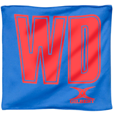 The Gilbert Pro Patch Bibs is a blue sports bib with large red 'WD' letters, ideal for team identification, and features the white and red Gilbert brand logo at the bottom right corner.