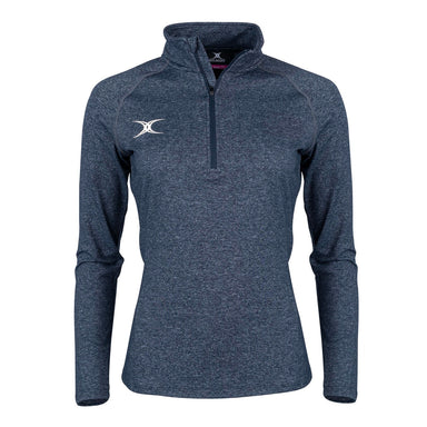 The Gilbert Atom Midlayer by Gilbert is a dark navy, long-sleeve quarter-zip athletic top with a white embroidered left chest logo, standing collar, and fitted, lightweight design, shown on a plain white background.