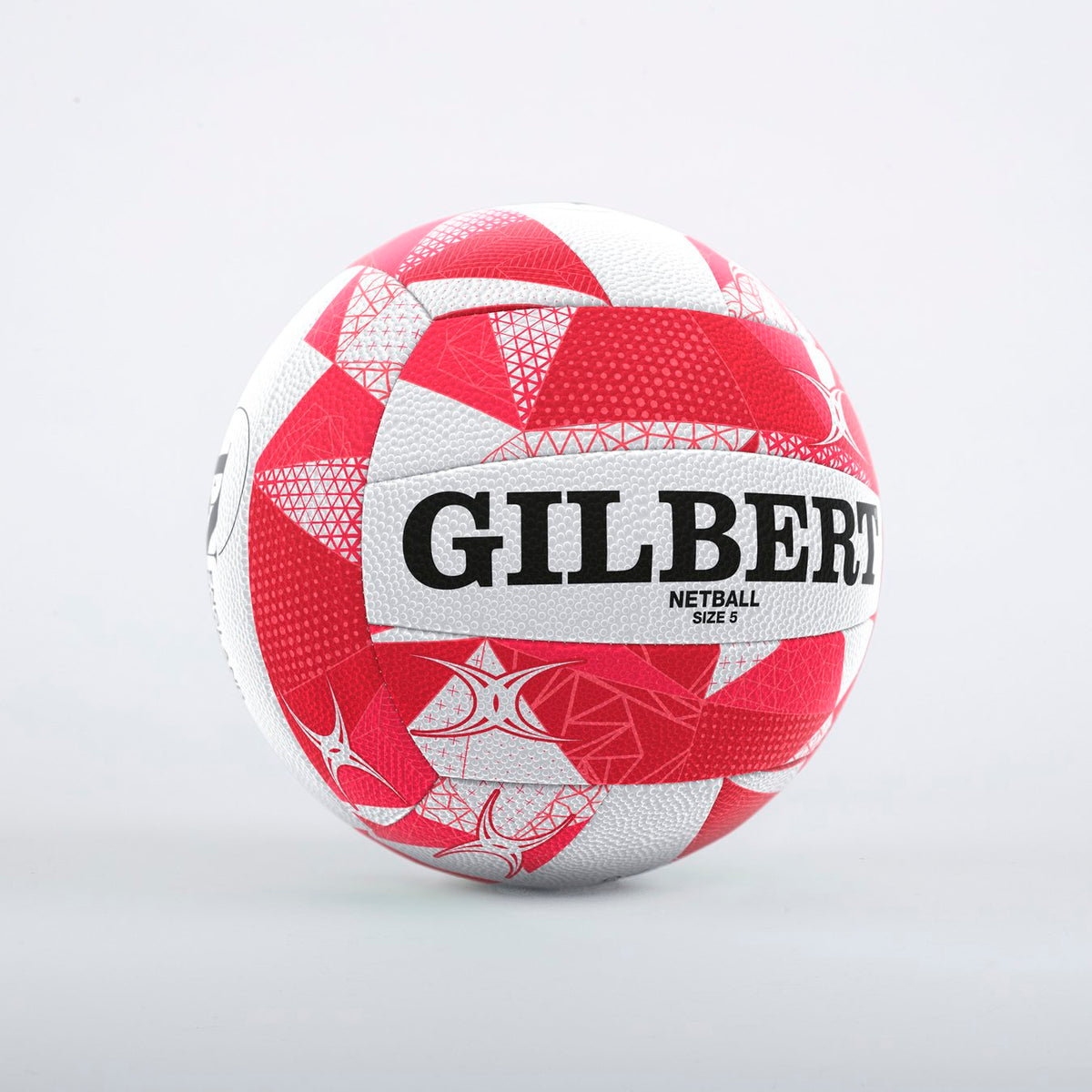 A Gilbert England Supporters Netball SZ5 by Gilbert, featuring a red and white pattern with bold black lettering, is displayed on a plain light gray background.