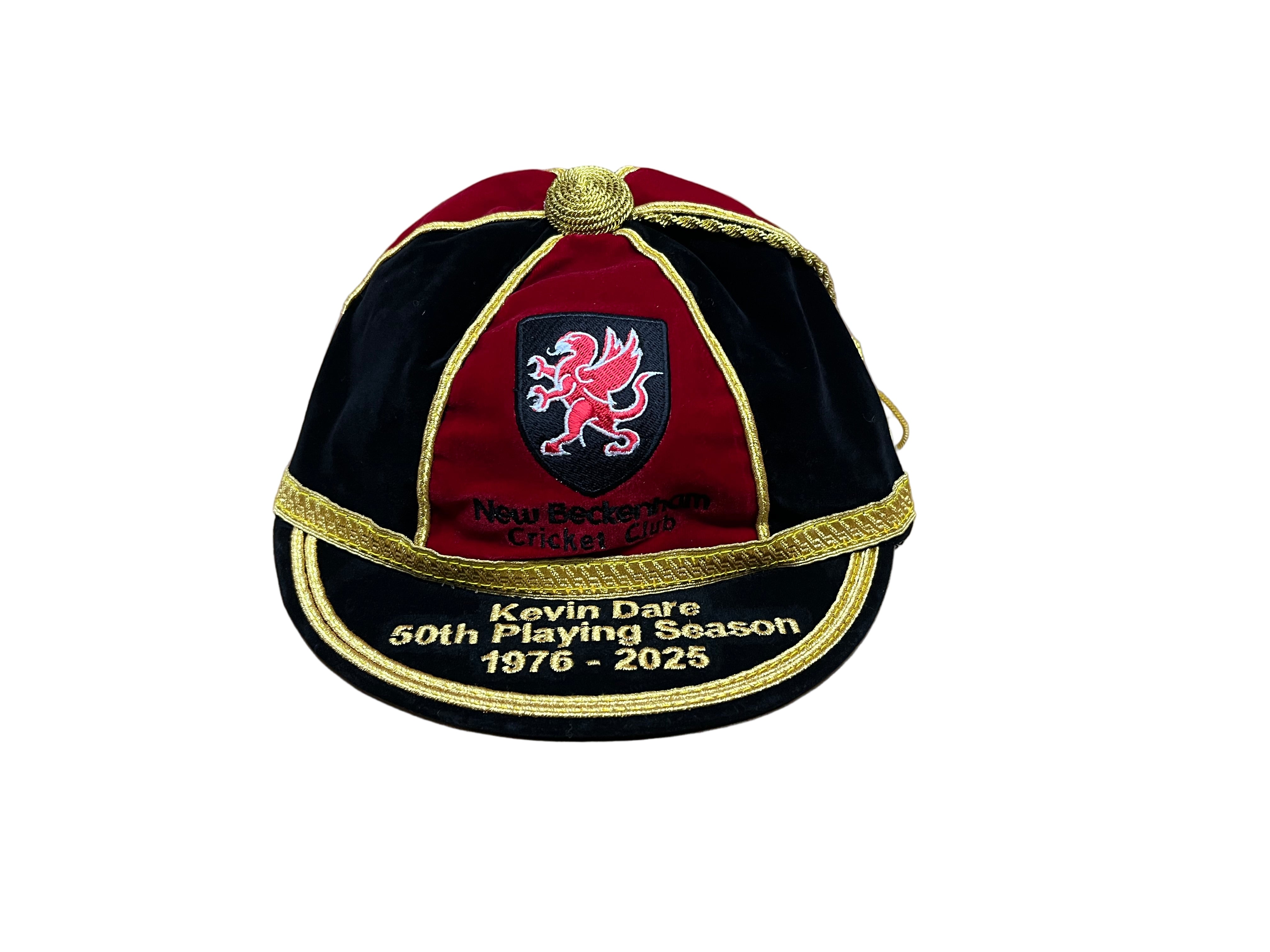 The Custom, Honour & Commemorative Caps by Martin Berrill Sports in red, black & gold feature an embroidered lion and text: “New Beckenham Cricket Club. Kevin Dare 50th Playing Season 1976-2025.” Ideal for collections.