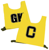 The Martin Berrill Sports Nylon Netball Printed Bib Set includes two yellow nylon bibs—one marked GK, the other C—each with bold black letters and convenient black straps at the bottom.