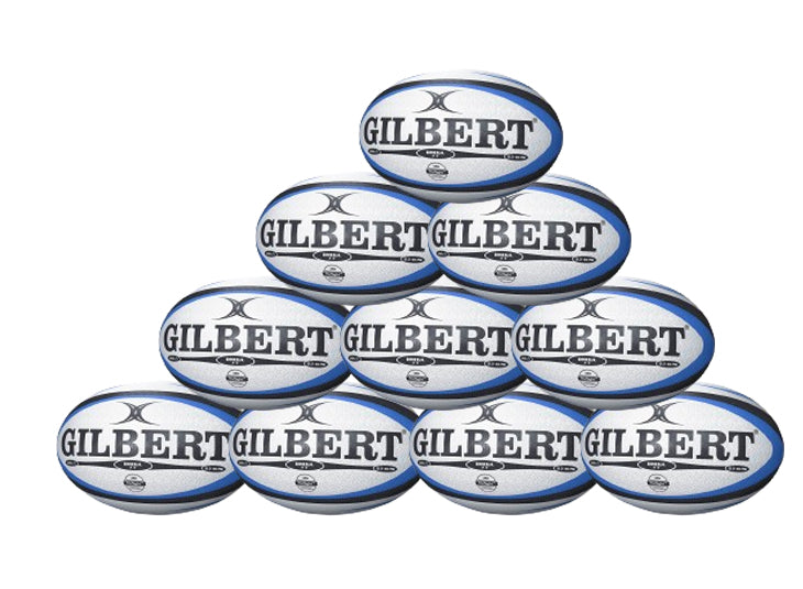 A ten-pack of Gilbert Omega match rugby balls, white with blue and black accents, is stacked in a pyramid formation against a white background.