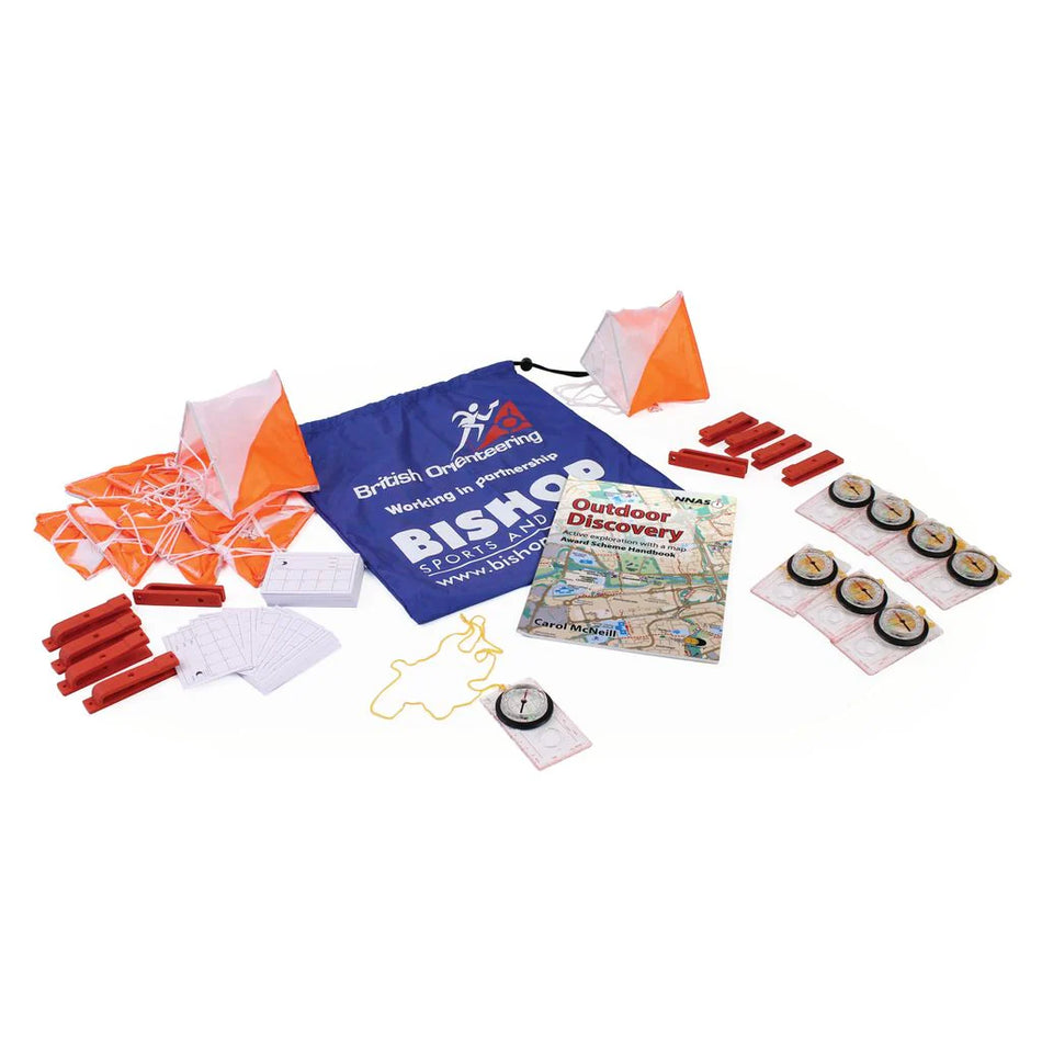 The Mastersport Official British Orienteering Starter Kit includes educational compasses, orange & white orienteering flags, a map, cards, string, and an Outdoor Discovery bag—ideal for beginners learning navigation skills.