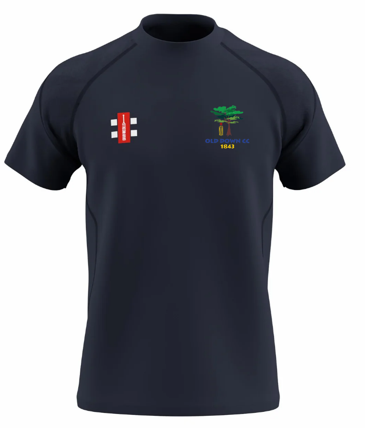 The Old Down CC GTS Men's S/S Tee Shirt by Gray Nicolls is a navy blue performance tee with short sleeves, a small red and white GTS emblem on the right chest, and a green tree logo with yellow OLD DOWN CC 1843 text on the left.
