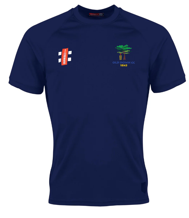 The navy blue Gray Nicolls Old Down CC Matrix V2 S/S T-Shirt has moisture-wicking fabric, a small tree emblem and OLD DOWN CC 1843 text on the left chest, plus a white and red logo on the right chest, set against a plain background.
