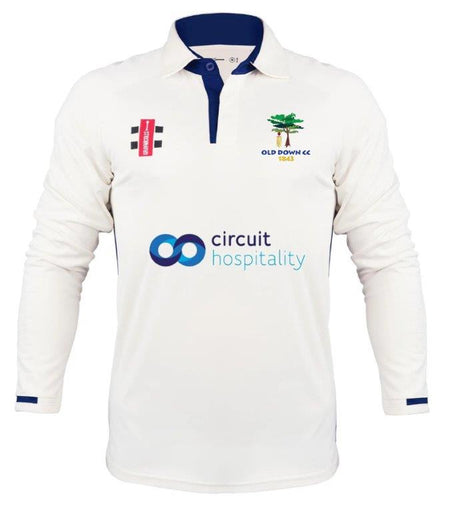 The Gray Nicolls Old Down CC Pro Performance V3 L/S Cricket Shirt features cooling fabric, a collar with blue accents, the OLD DOWN CC badge, and sponsor logos including Circuit Hospitality.