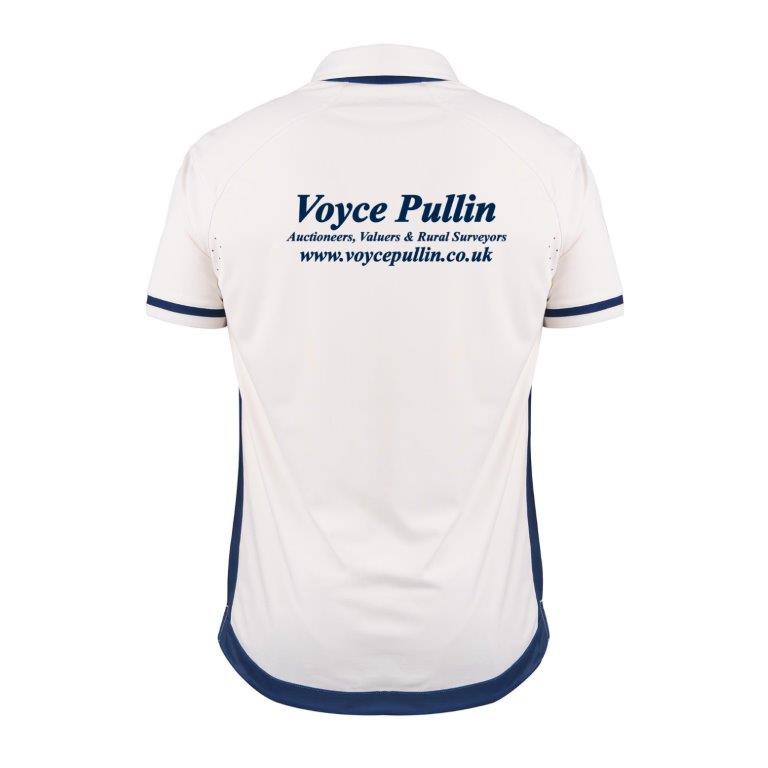 Back view of a white Gray Nicolls Old Down CC Pro Performance V3 S/S Cricket Shirt with navy trim and anti-UV fabric. "Voyce Pullin Auctioneers, Valuers & Rural Surveyors www.voycepullin.co.uk" is printed in navy on the upper back.