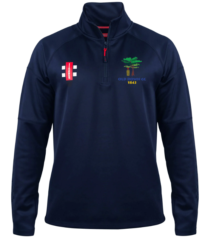 The Gray Nicolls Old Down CC Pro Thermo Fleece is a navy quarter-zip pullover with a red zipper, club logo and "1843" on the left chest, plus a red patch with white cricket stumps on the right chest for extra style and warmth.