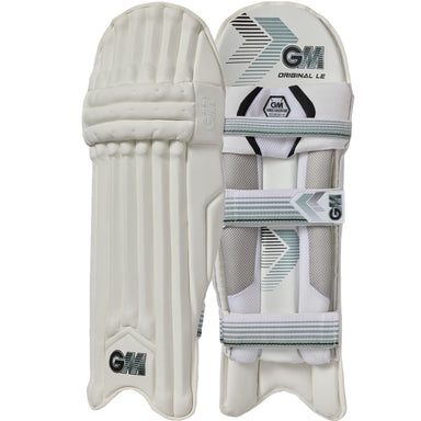 A pair of Gunn & Moore Original L.E. Batting Pads 2026 in white with grey and black accents, showcasing the GM logo. One pad shows the front; the other displays inner straps, padding, and triple-layered knee protection.