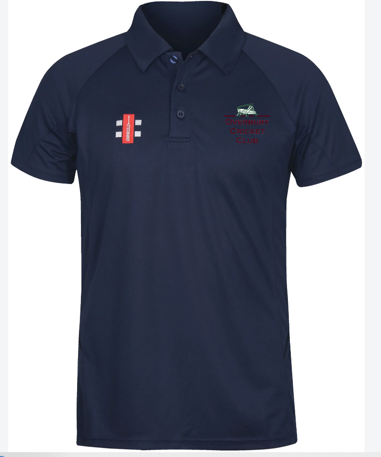 The Overbury CC Matrix V2 Polo Shirt (Coaches) by Gray Nicolls is a navy blue polo with a collar, buttoned placket, red "Overseas Cricket Club" embroidery on the left chest, multicolor logos, and moisture-wicking comfort.