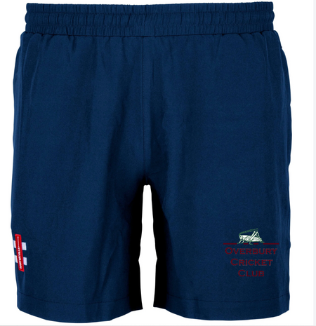 The Overbury CC Velocity Shorts (Coaches) by Gray Nicolls are navy blue training shorts with an elastic waistband and embroidered Overbury Cricket Club logos—premium sportswear ideal for cricket training.