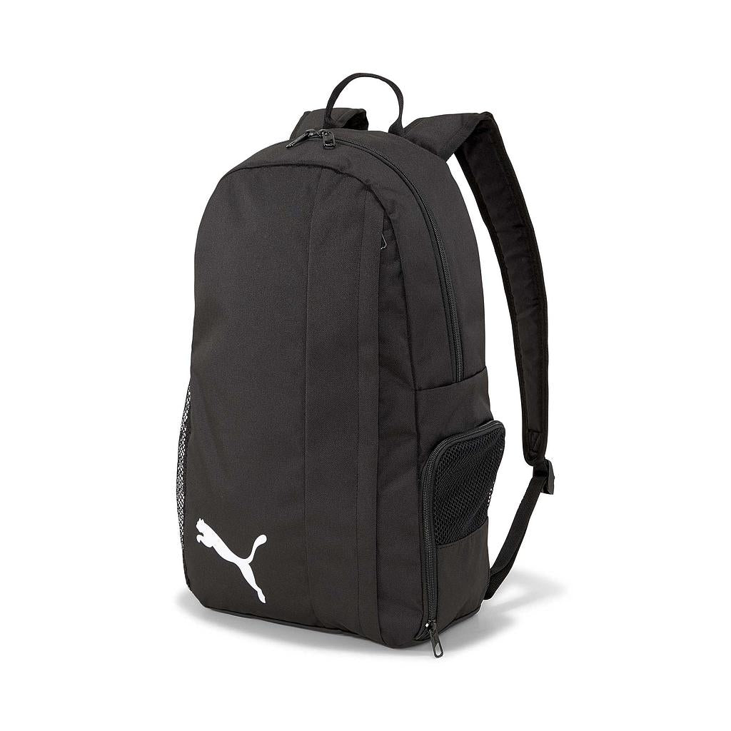 The Puma Team Goal 23 Backpack with Boot Compartment is a black 24L sports bag featuring a white Puma logo, top handle, adjustable padded straps, and side mesh pockets, shown against a white background.