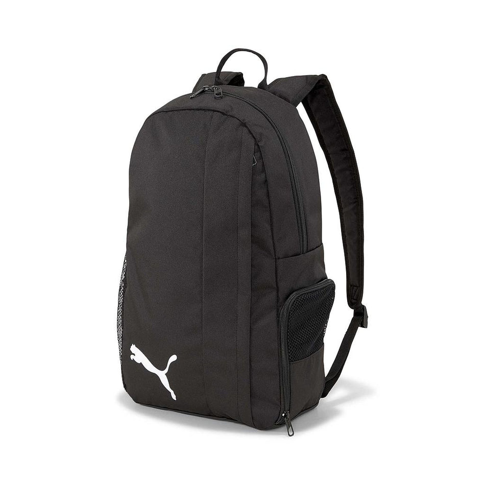 The Puma Team Goal 23 Backpack with Boot Compartment is a black 24L sports bag featuring a white Puma logo, top handle, adjustable padded straps, and side mesh pockets, shown against a white background.
