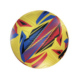 The Puma Orbita 6 EFL Sky Bet Training Football 24/25 by Puma features a yellow/multi colorway with bold, angular blue, red, and black patterns on its 32-panel surface for a soft touch, displayed against a white background.