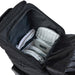 A Gunn & Moore Players Edition Duffle Bag 2026 by Gunn & Moore is unzipped and open, showing white cricket batting pads and gloves neatly arranged in customizable compartments, with space left for a bat, as seen from above.