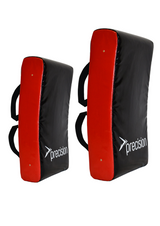 Two Precision Curved Hit Shields from Precision Training, featuring red sides, black fronts with the logo, and two black handles on the back. The set includes one larger pad—perfect for rugby tackling drills.