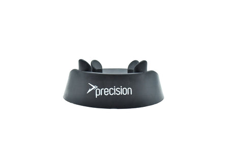 The Precision Training Rugby Kicking Tee features a black moulded rubber design with curved, raised sections for optimal kicking accuracy. "Precision" and the logo are printed in white on the front against a plain white background.