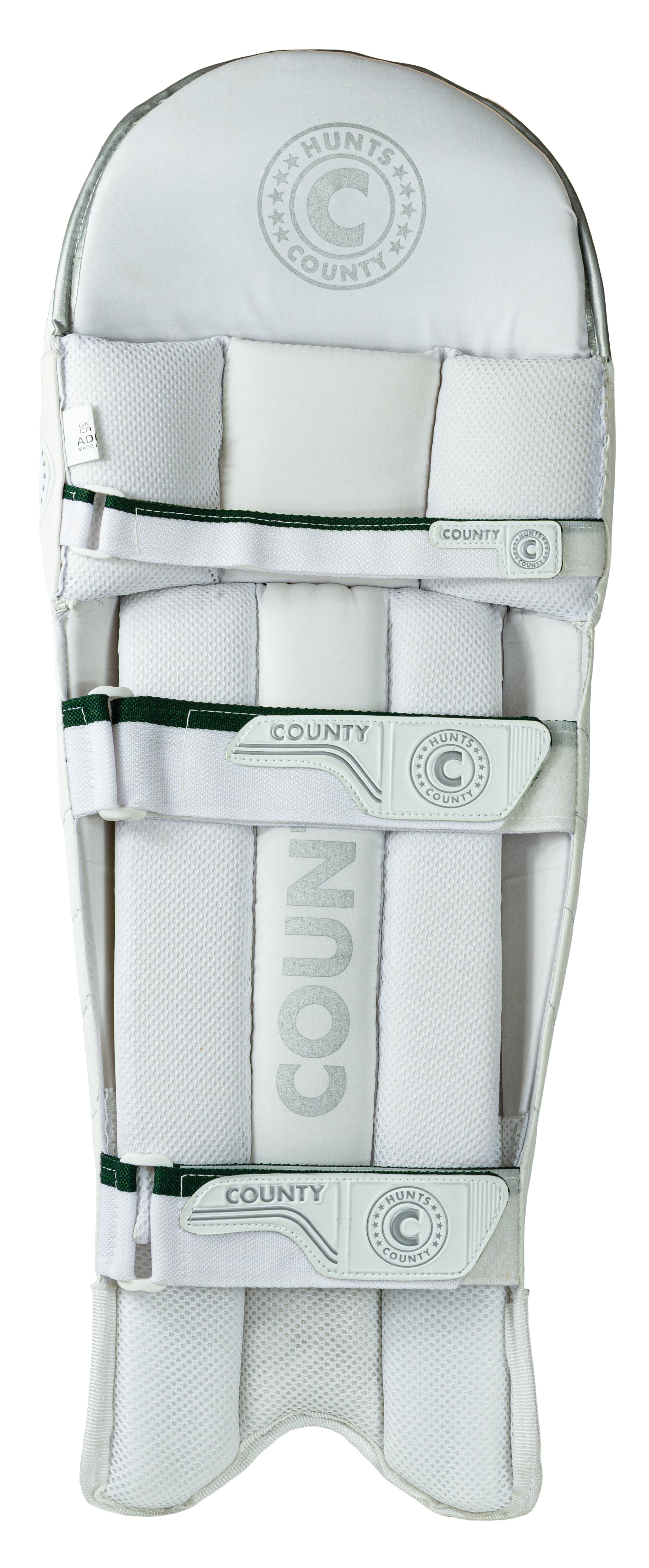 The Hunts County Triumph Batting Pads are white, ambidextrous pads with multiple straps and stitched detailing. Designed for club cricketers, they feature reinforced padding and the Hunts County brand for optimal protection.
