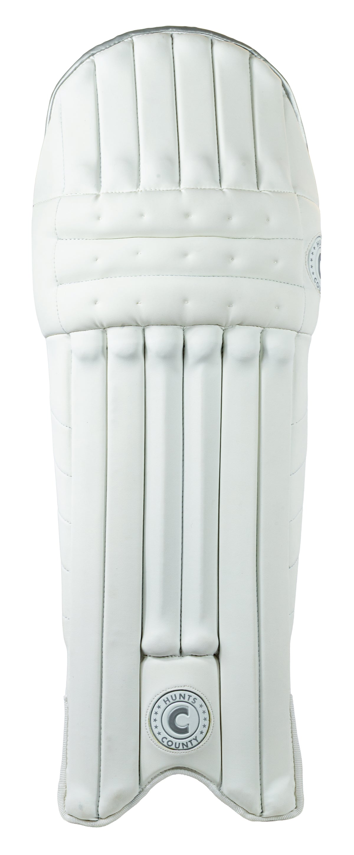 A single white Hunts County Triumph Batting Pad with stitched sections and vertical padding, shown from the front. Ambidextrous design suits club cricketers, featuring Hunts County logos at the top right and bottom center.