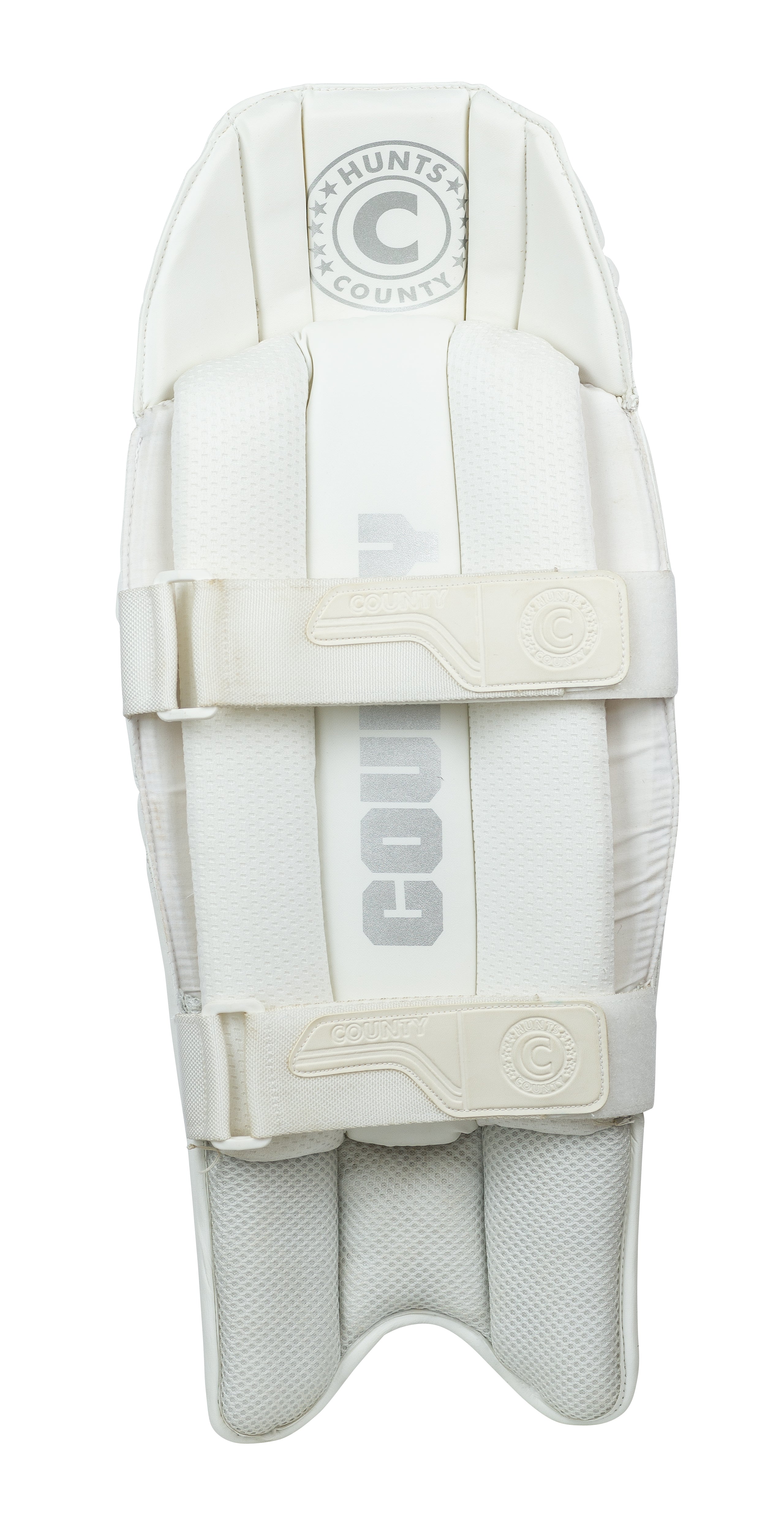 The Hunts County Platinum Wicket Keeping Pads are lightweight, test-level white pads with "Hunts County" in gray, two padded straps, and a textured protective surface, shown on a white background.