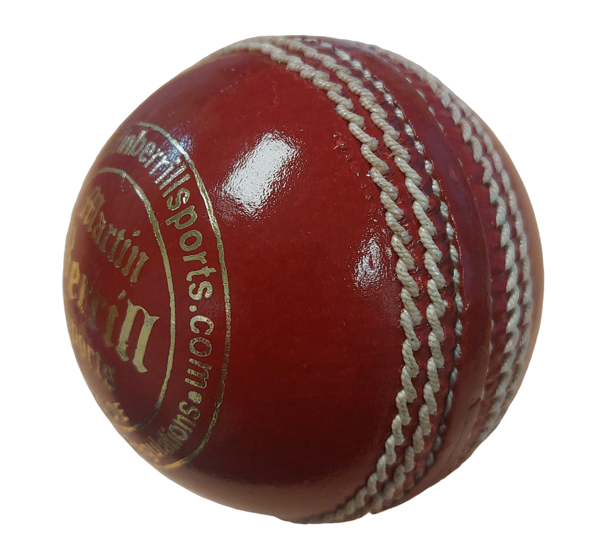 A close-up of the shiny red MBS Platinum Crown Cricket Ball by Martin Berrill Sports, featuring visible white stitching and gold text on its surface, displayed against a white background.