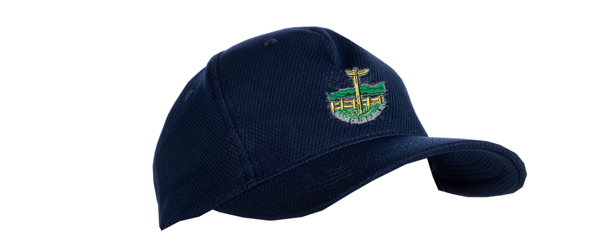 The Penydarren Country XI CC Cricket Cap by Gray Nicolls is a navy blue, adjustable-fit cap with a vibrant embroidered cross, green hills, and yellow structure on the front—photographed on a plain white background.