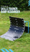A curved black and blue Precision Training PrecisionPLAY Skills Trainer Ramp Rebounder sits on grass, ideal for sports training as a ramp rebounder or passing board. "Skills Trainer Ramp Rebounder" text is displayed above.