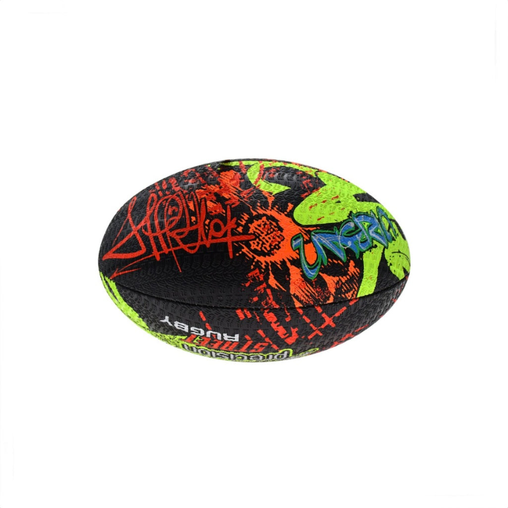 The Precision Street Mania Rugby Ball by Precision Training features bright red, green, and blue graffiti-style designs on black vulcanised rubber and is shown against a plain white background.
