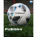 The Precision Training Fusion+ FIFA Basic Training Ball, featuring a durable white and black design with blue accents, rests on green turf. A soccer goal and red fencing blur in the background, highlighting its precision and consistency.