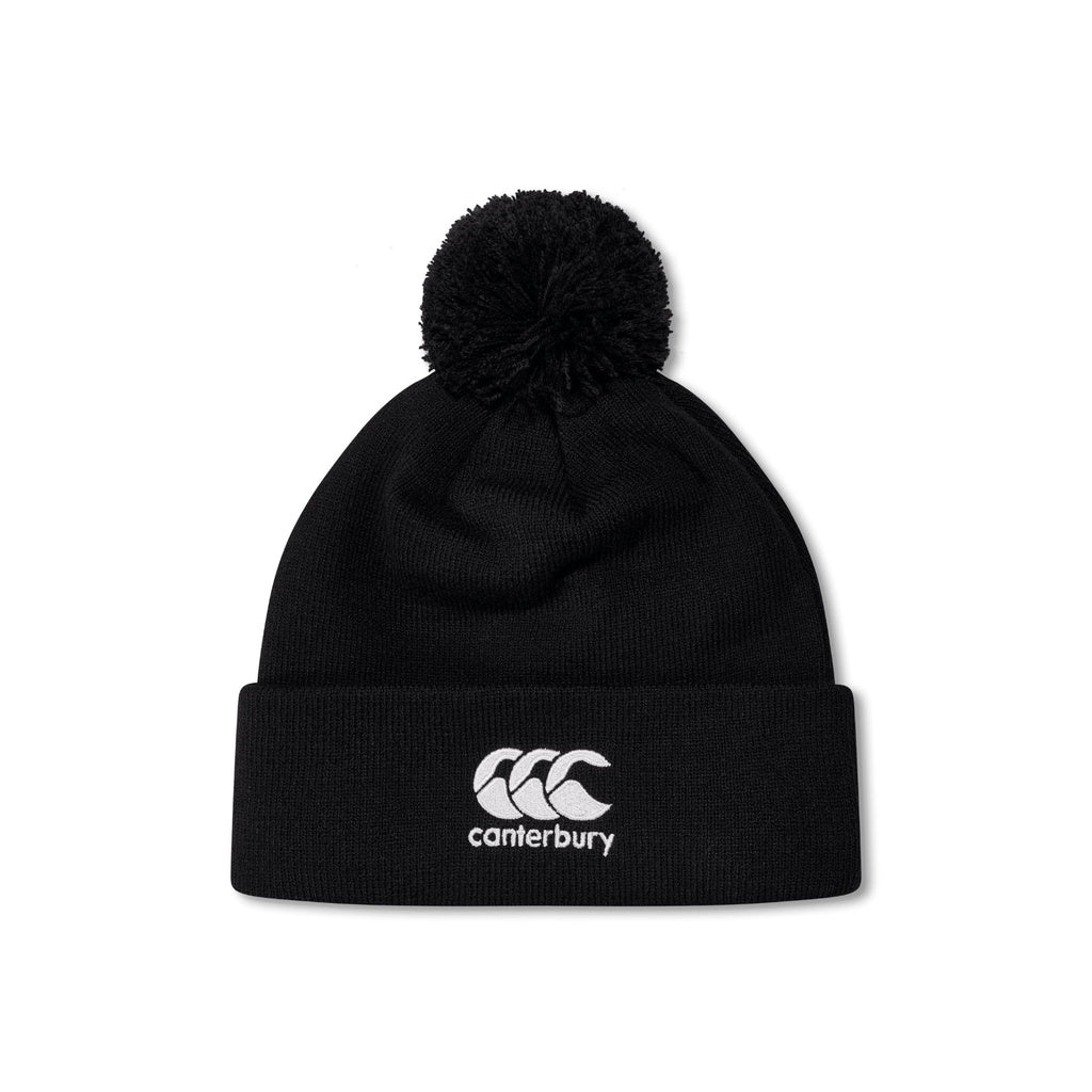 The Canterbury Club Bobble Hat by Canterbury is a black fleece-lined hat featuring a pom-pom, folded brim, and white embroidered logo—your perfect winter go-to.