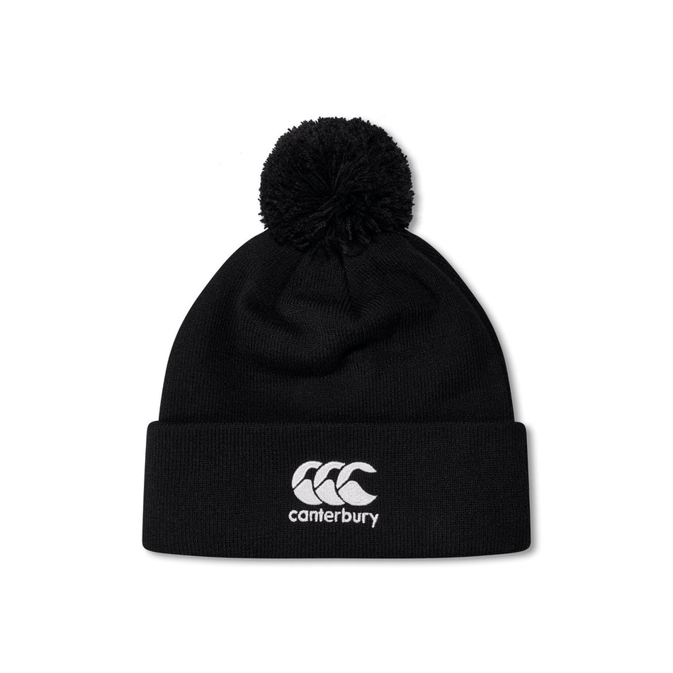 The Canterbury Club Bobble Hat by Canterbury is a black fleece-lined hat featuring a pom-pom, folded brim, and white embroidered logo—your perfect winter go-to.