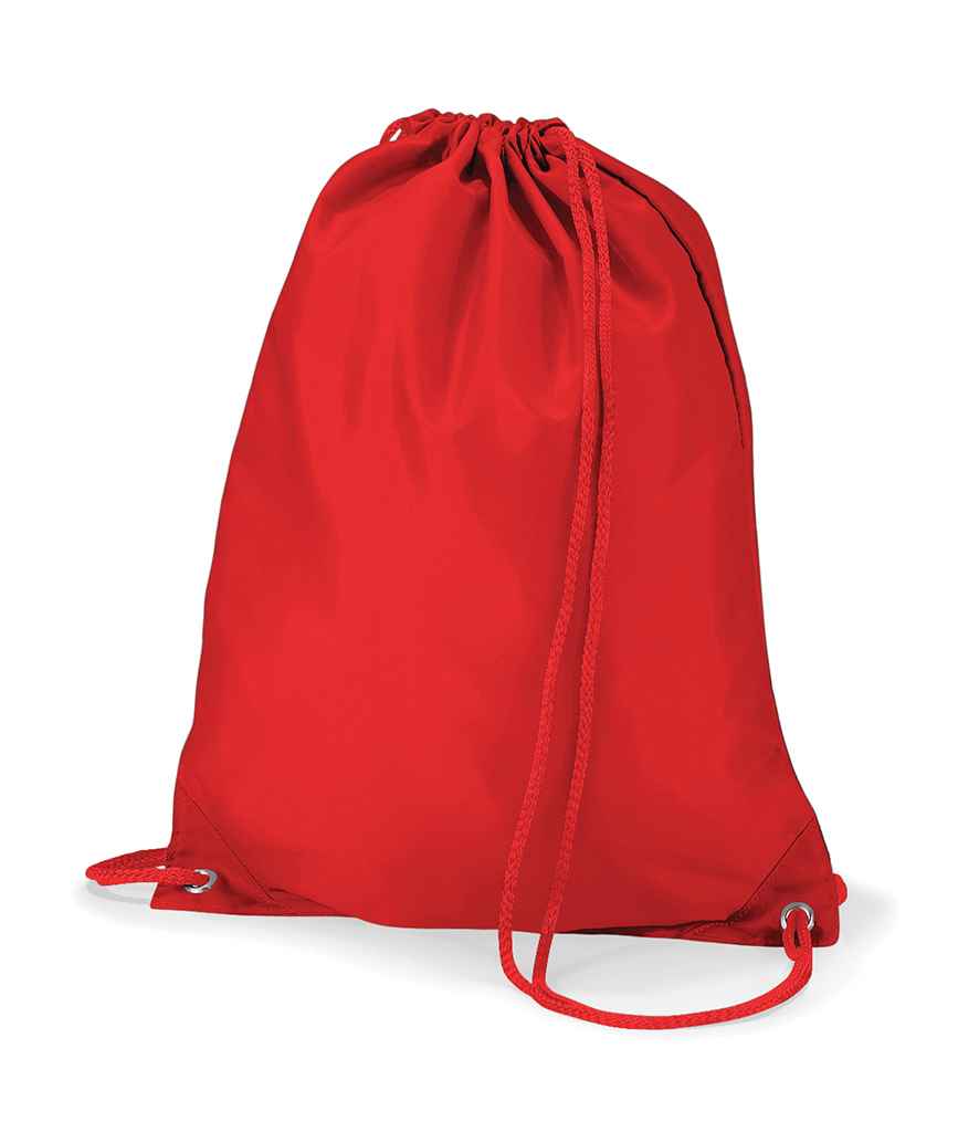 The Quadra Gymsac by Quadra is shown upright against a white background. This bright red drawstring bag features matching drawcord handles and reinforced corners with metal eyelets at the bottom. The bag appears empty.