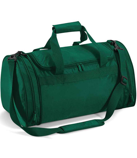 The Quadra Sports Holdall by Quadra is a green 32L duffel bag with a zippered main compartment, two side pockets, padded Velcro hand grips, and an adjustable shoulder strap with padding.