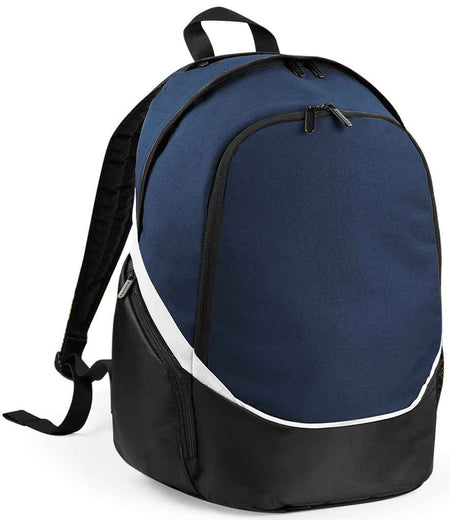 The Quadra Pro Team Backpack by Quadra comes in French Navy/Black/White, features 17L capacity, two zippered compartments, a wet pocket, top handle, and padded shoulder straps.