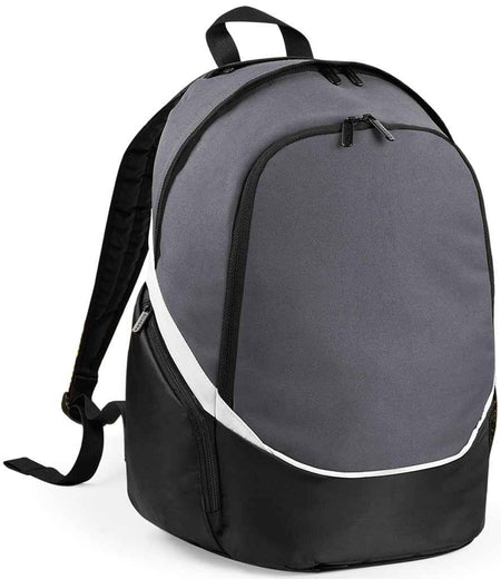 The Quadra Pro Team Backpack by Quadra, in Graphite Grey/Black/White, features a 17L capacity, front zipper pocket, white diagonal accent stripe, wet pocket, and padded shoulder straps. It stands upright against a white background.