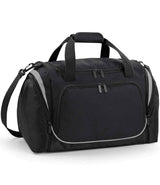 The Quadra Pro Team Locker Bag by Quadra in Black/Light Grey features a large front zip pocket, two top handles, adjustable shoulder strap, side compartments, a shoe tunnel, and a modern design with subtle light grey trim.