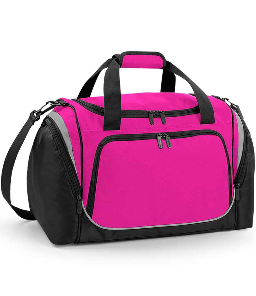 The Quadra Pro Team Locker Bag by Quadra features a fuchsia front and top, black sides and base, dual black handles, detachable shoulder strap, large front zippered pocket with light grey trim, and a handy shoe tunnel.