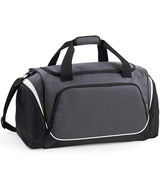 The Quadra Pro Team Locker Bag by Quadra features a Graphite Grey/Black/White design, black handles, padded shoulder strap, zipped side pockets, a large front pocket with white piping, and a shoe tunnel for easy organization.