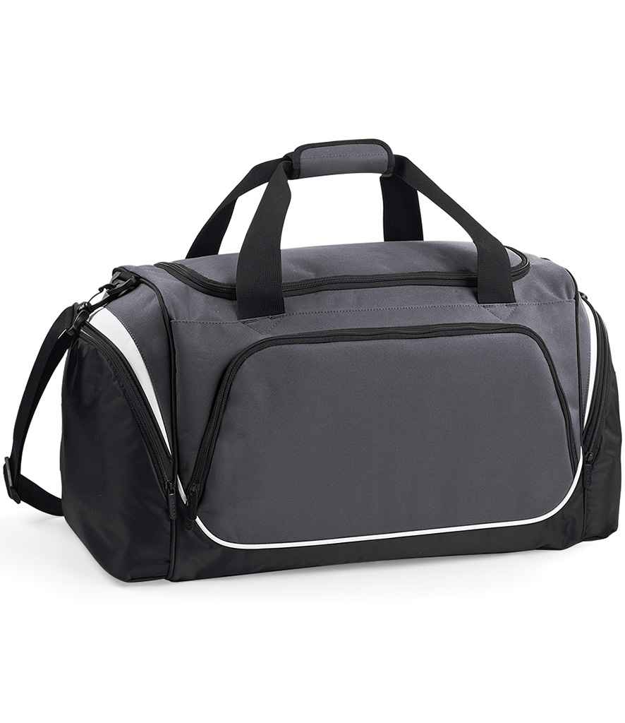 The Quadra Pro Team Locker Bag by Quadra features a Graphite Grey/Black/White design, black handles, padded shoulder strap, zipped side pockets, a large front pocket with white piping, and a shoe tunnel for easy organization.