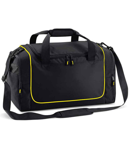The Quadra Teamwear Locker Bag by Quadra comes in Black/Yellow, with a 30L capacity, front zip pocket, side mesh pocket, padded handle grip, and adjustable shoulder strap.