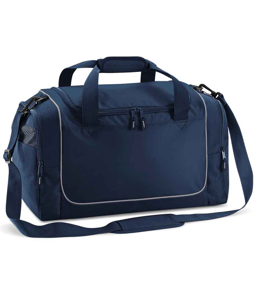 The Quadra Teamwear Locker Bag by Quadra in French Navy/Light Grey features black zippers, a front zip pocket, dual padded handles, side mesh pocket, 30L capacity, and an adjustable shoulder strap.