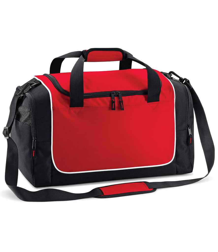 The Quadra Teamwear Locker Bag by Quadra comes in Red/Black and features an adjustable shoulder strap, carrying handles, a front zippered pocket, mesh side pocket, and white trim accents.