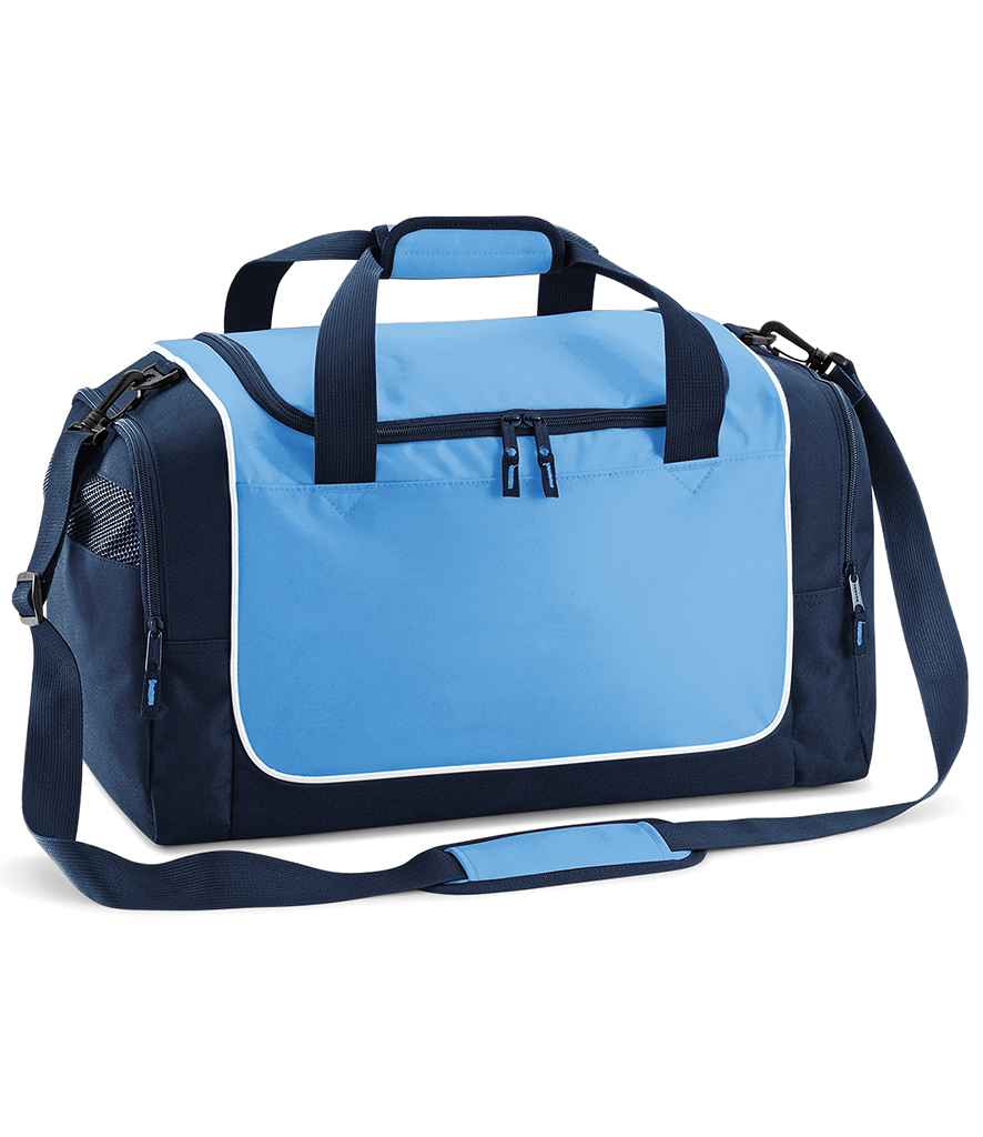 The Quadra Teamwear Locker Bag by Quadra in Sky Blue/Navy/White features black handles, an adjustable shoulder strap, front zip pocket, side mesh pockets, white piping accents, top zipper closure, and a roomy 30L capacity.