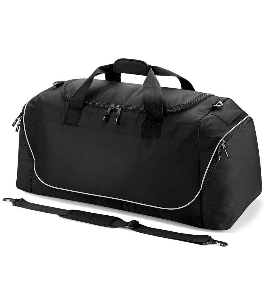 The Quadra Teamwear Jumbo Kit Bag by Quadra in Black/Light Grey features a large capacity, adjustable shoulder strap, two carry handles, side and front zippered pockets, shown against a white background.