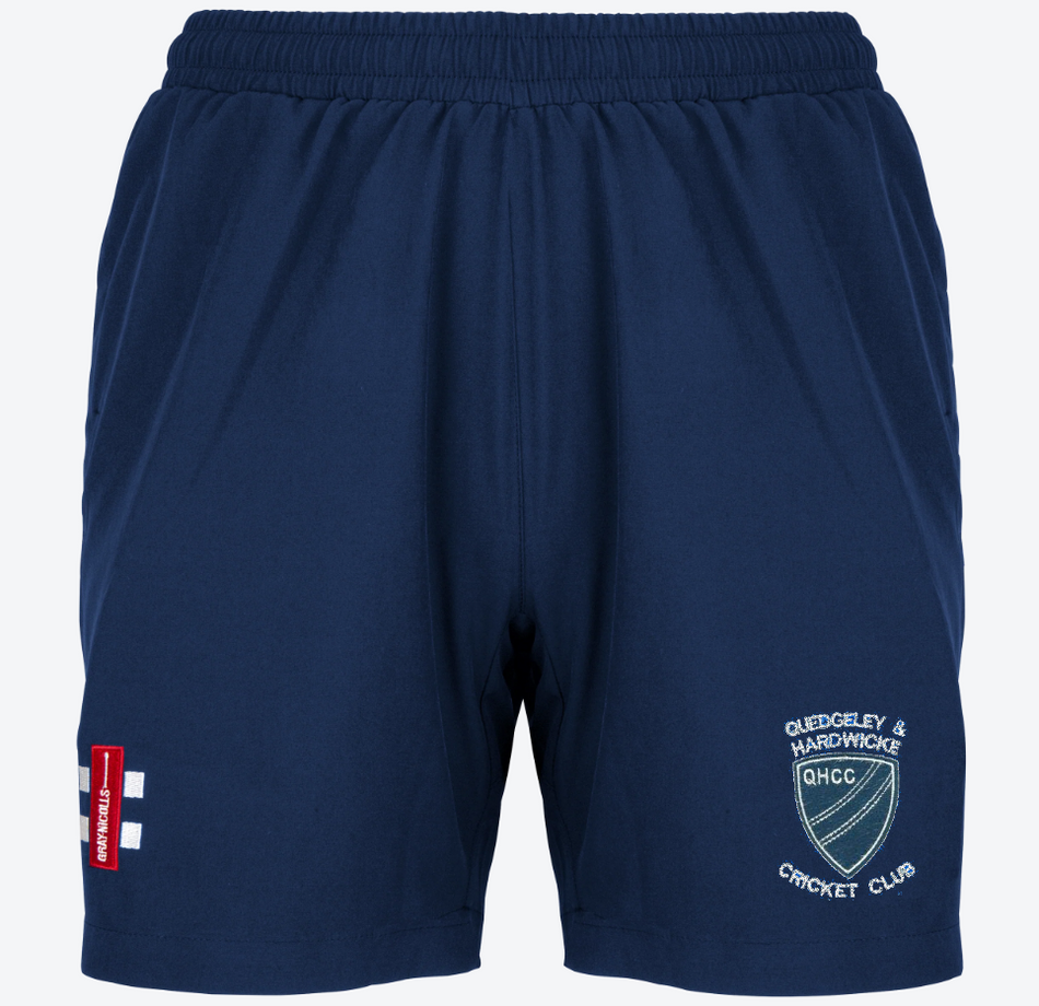 The Gray Nicolls Quedgeley & Hardwicke CC Ladies Velocity Shorts feature the club crest on the right leg and a red England cricket logo on the left, making them ideal cricket training shorts. Displayed against a white background.