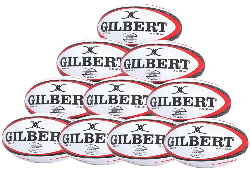 Ten Gilbert Orion Match Rugby Balls in black/red are stacked in a pyramid, each featuring the GILBERT brand and logo—ideal for your next match. Available as a convenient ten-pack.