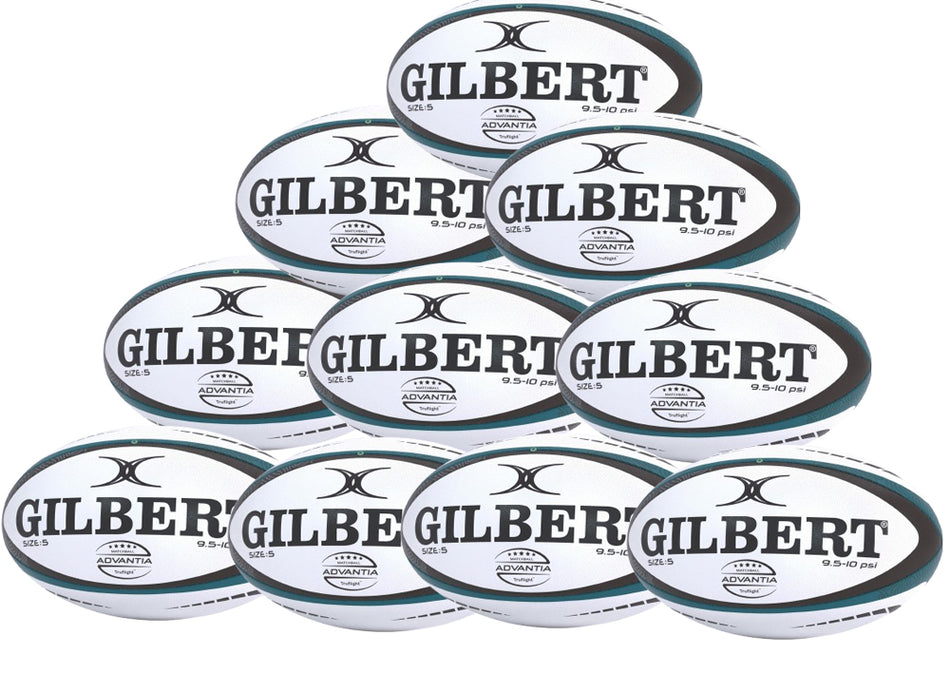 A ten-pack of Gilbert Advantia Match Rugby Balls, featuring black stripes and bold "GILBERT" branding, is neatly stacked in a pyramid formation.
