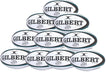 A ten-pack of Gilbert Advantia Match Rugby Balls, featuring black stripes and bold "GILBERT" branding, is neatly stacked in a pyramid formation.