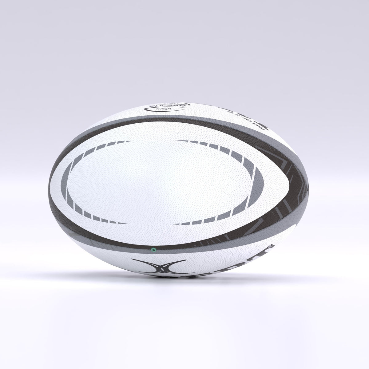 The Gilbert Pulsar Match Rugby Ball by Gilbert, in white with black and gray curved patterns and hand-stitched to World Rugby standards, stands upright on a smooth, light surface against a softly lit, neutral background.